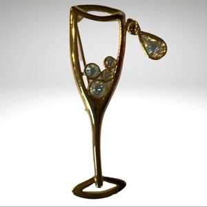 Lianna, Inc. marked ©LIA Champagne Glass Brooch with Rhinestone Bubbles